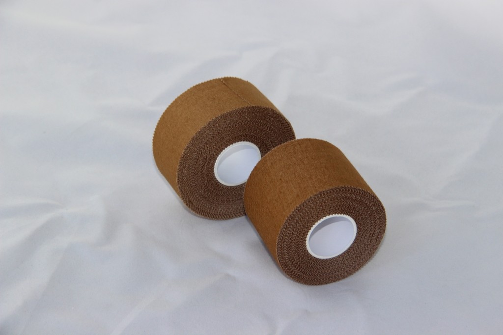 China Tan Coloured Rayon Cloth Rigid Strapping Tape / Sports Strapping Tape wholesale