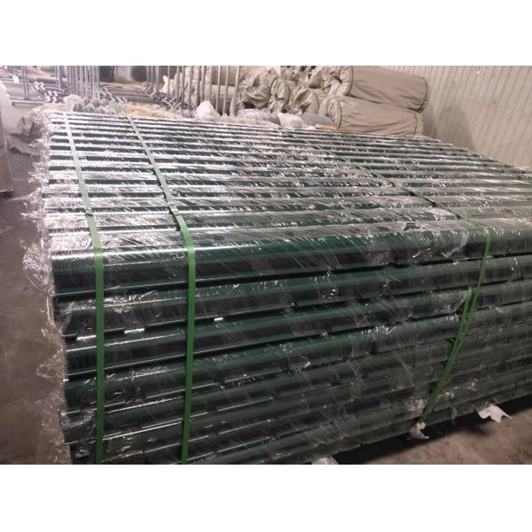 green colored curved mesh fence post