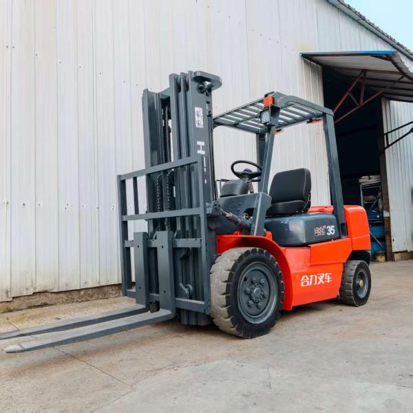 Second-Hand Heli 3.5 Ton 3-Mast Manual Forklift, High-Strength Steel Frame, Orange Color, Perfect for Heavy-Duty Material Handling in Industrial and
