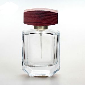 China 50ml Clear glass perfume bottle with cap and pump spray collarwith wooden caps on sale
