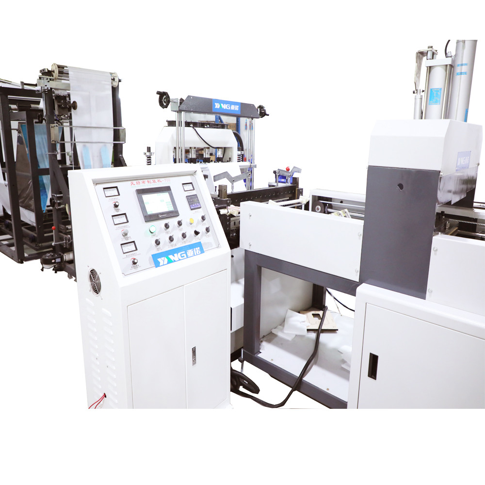 Quality YANUO 100pcs/Min Non Woven Bag Making Machine , 220V Cloth Carry Bag Making Machine for sale