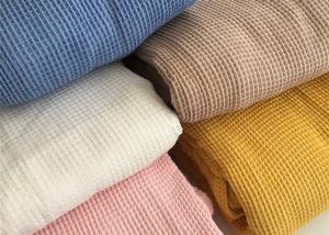 China 100%cotton knitted fabric popular in autumn/winter CVC waffle fabric for hotel pajamas, nightgowns and slippers on sale