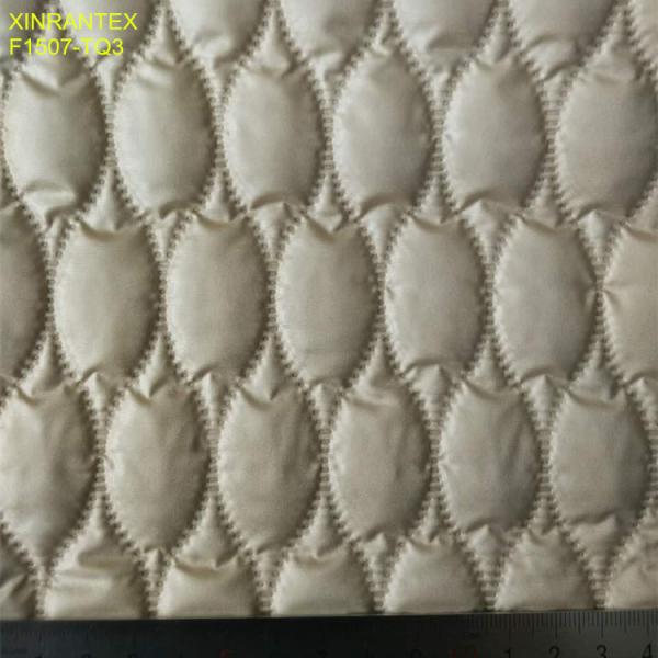 F1507-TQ1 ultrasonic embossing laminating 100% polyester termo qualiting fabric for winter heavy downcoat
