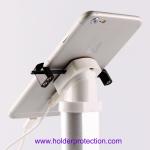 COMER Gripper recoiler inside security alarm display dock for mobile cell phone