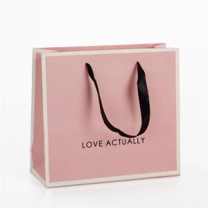 China Personalised Pink Branded Paper Gift Bags With Black Ribbon Handles wholesale