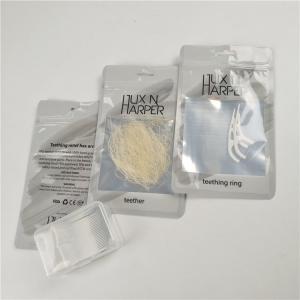 China Glossy clear front dental floss hang hole plastic bags aluminum foil customized zip lock bag packaging wholesale