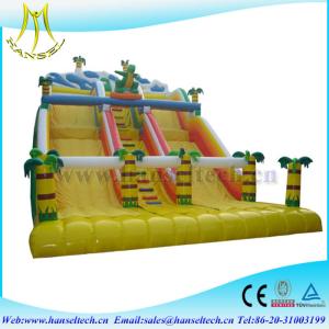China Hansel attractive kids amusement park games inflatable climbing wall with slide on sale