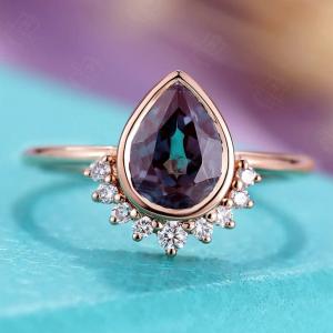 China Rose Gold Plating 925 Sterling Silver CZ Moonstone Wedding Rings Pear Cut Moonstone Ring Set wholesale