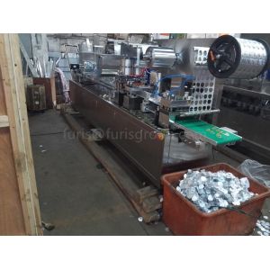 Blister Packing Machine With Liquid Feeder And Peristaltic Pump