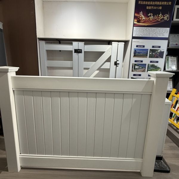 Premium PVC privacy fence installation example showing clean white panels