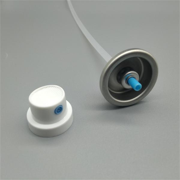 Aerosol valve components disassembled