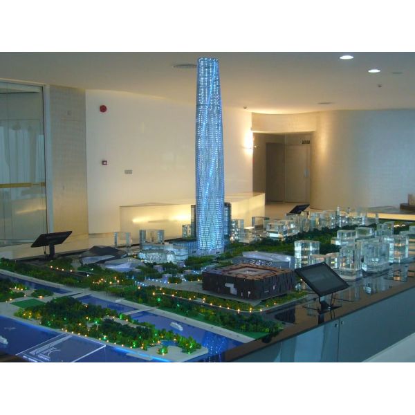 Architectural Model of Futuristic Glass Skyscraper with Illuminated Facade and Mixed-Use Complex