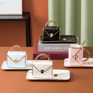 China Custom Luxury Ceramic Mug With Spoon Gold Handle 310ml Capacity wholesale